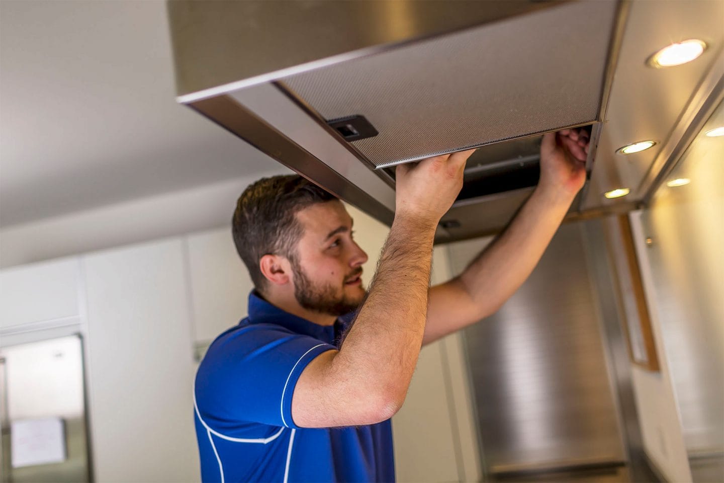 Kitchen hood installer fitting commercial canopy in Oxford